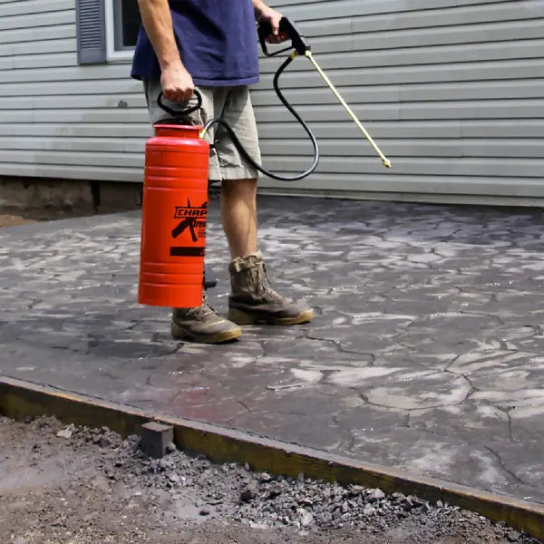 Concrete sprayer sealing pavers