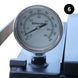 Marathon brand thermometer on a metal surface with a white background