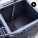 Metal storage box with open lid, showing 'Marathon' branding, on a light background.
